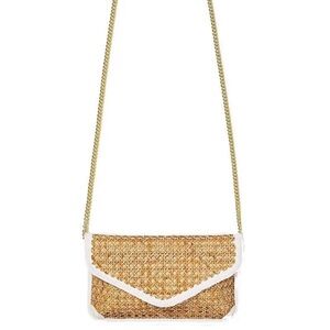 Lily Pulitzer are St. Bart’s Cane clutch in Natural
